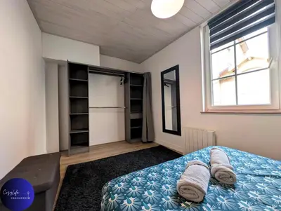 Un ou plusieurs lits dans un hébergement de l'établissement Le Paul by CozyLife - Centre Ville - Gare