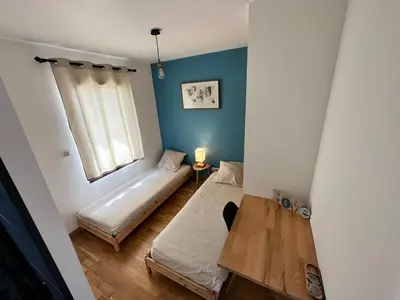 Un ou plusieurs lits dans un hébergement de l'établissement Chambre privée au calme - Proche gare - Parking gratuit