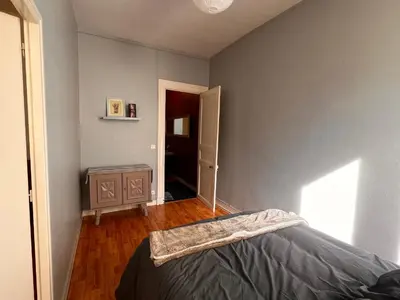 Un ou plusieurs lits dans un hébergement de l'établissement La Colbertine - Charming Apartment in Place Colbert