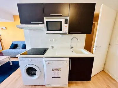 Cuisine ou kitchenette dans l'établissement Taouata - Face au port