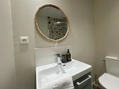 Salle de bains dans l'établissement La Maison D'Oscar
