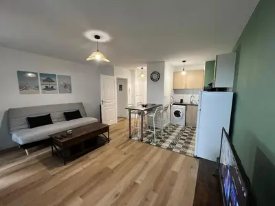 Cuisine ou kitchenette dans l'établissement Appartement cosy au calme avec jardin et parking