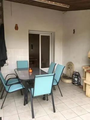 Coin salon dans l'établissement Agréable maison