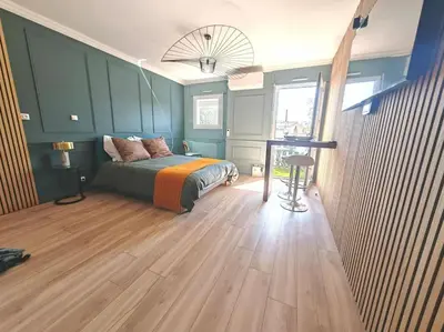 Coin salon dans l'établissement Appartement cosy climatisé