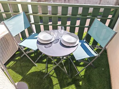 Balcon ou terrasse dans l'établissement Appartement cosy climatisé