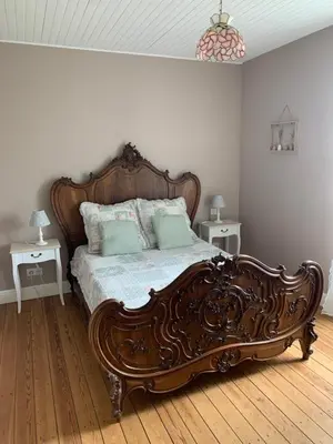 Un ou plusieurs lits dans un hébergement de l'établissement The Cool Lounge à Coulonges - Charente