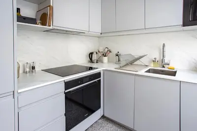 Cuisine ou kitchenette dans l'établissement Appartement entier avec place de parking