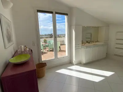 Cuisine ou kitchenette dans l'établissement La Rose des vents