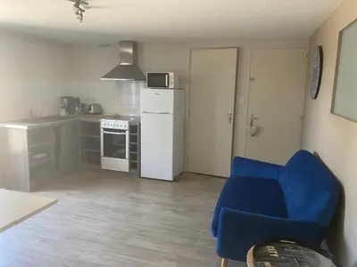 Cuisine ou kitchenette dans l'établissement Logement des pivoines