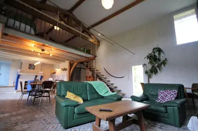 Coin salon dans l'établissement Gîte La Vigne Verte