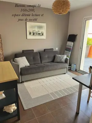 Coin salon dans l'établissement La Maison du Bonheur