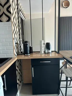 Cuisine ou kitchenette dans l'établissement La Parenthèse Rochelaise