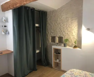 Un ou plusieurs lits dans un hébergement de l'établissement La Grange de la Brousse