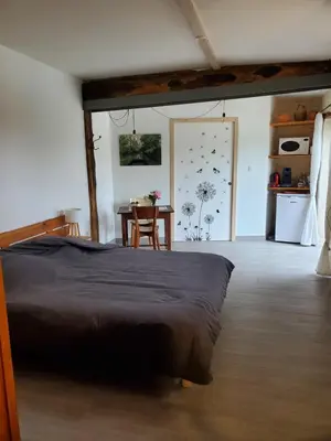 Un ou plusieurs lits dans un hébergement de l'établissement Damvix Chambre d hôtes La Barbée