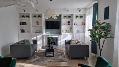 Coin salon dans l'établissement Appartement neuf avec garage + fibre