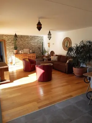 Coin salon dans l'établissement Verdure et calme proche ville