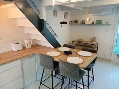 Cuisine ou kitchenette dans l'établissement Appartement 4 personnes bord mer