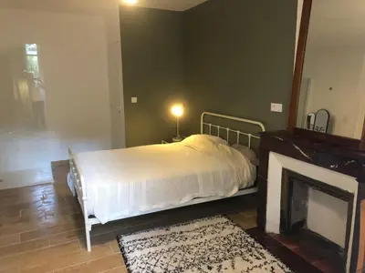 Un ou plusieurs lits dans un hébergement de l'établissement Chambre d’hôtes