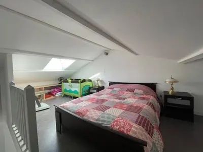 Un ou plusieurs lits dans un hébergement de l'établissement Chambre à la campagne