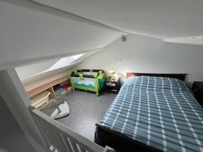 Un ou plusieurs lits dans un hébergement de l'établissement Chambre à la campagne