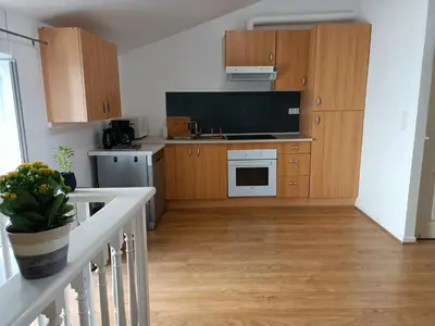 Cuisine ou kitchenette dans l'établissement Véritable petit nuage