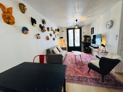 Coin salon dans l'établissement Le Petit Ré, Garage privé, Terrasse, Hyper centre