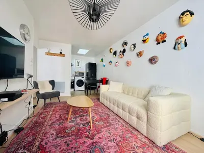 Télévision ou salle de divertissement dans l'établissement Le Petit Ré, Garage privé, Terrasse, Hyper centre