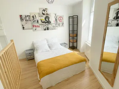Un ou plusieurs lits dans un hébergement de l'établissement Appartement T2