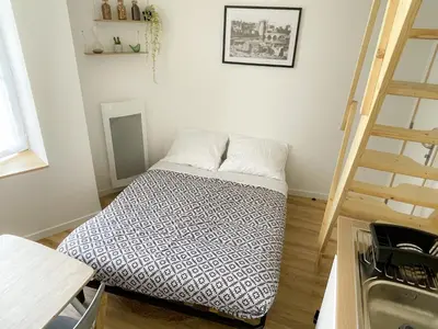 Un ou plusieurs lits dans un hébergement de l'établissement Appartement T2