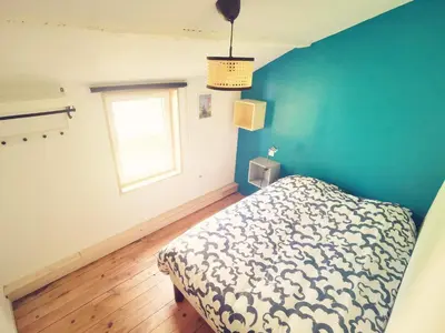 Un ou plusieurs lits dans un hébergement de l'établissement Les chambres de Cherveux