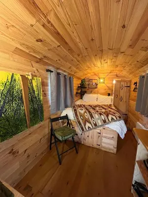 Un ou plusieurs lits dans un hébergement de l'établissement Les logements insolites de la Base Nautique