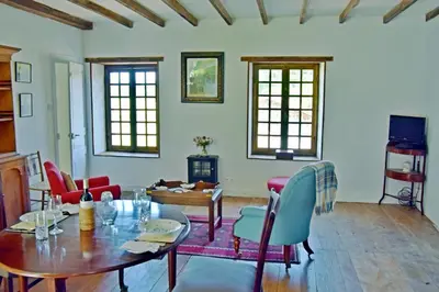 Coin salon dans l'établissement Gite Du Jardin