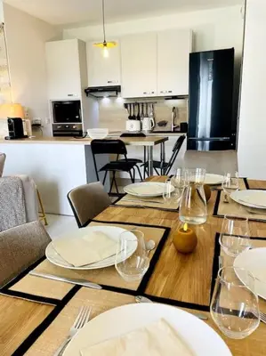 Cuisine ou kitchenette dans l'établissement Le Berlioz - Jardin privatif