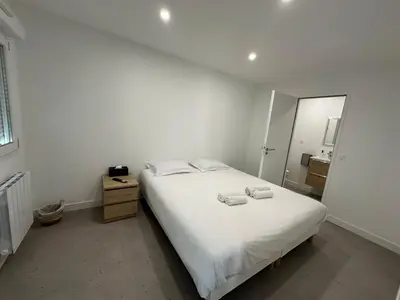Un ou plusieurs lits dans un hébergement de l'établissement Halte Hotel - 1 étoile