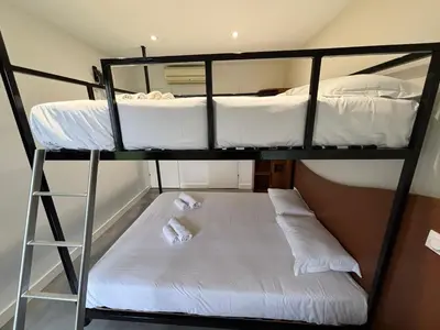 Un ou plusieurs lits dans un hébergement de l'établissement Halte Hotel - 1 étoile