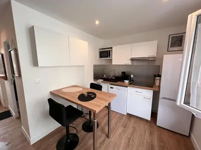 Cuisine ou kitchenette dans l'établissement Cosy Appart - 4 personnes