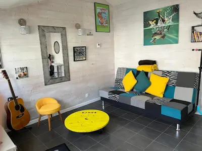 Coin salon dans l'établissement Maisonnette 40