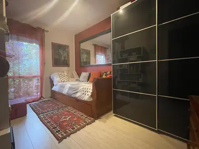 Un ou plusieurs lits dans un hébergement de l'établissement Charmante maison pour vos vacances