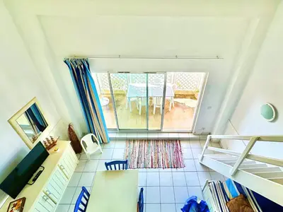 Un ou plusieurs lits dans un hébergement de l'établissement Vue Mer et Piscine, avec Balcon - 1 min de la plage