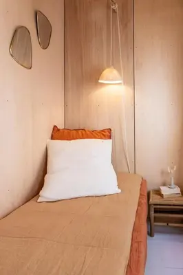 Un ou plusieurs lits dans un hébergement de l'établissement Appartement au cœur de La Rochelle avec terrasse