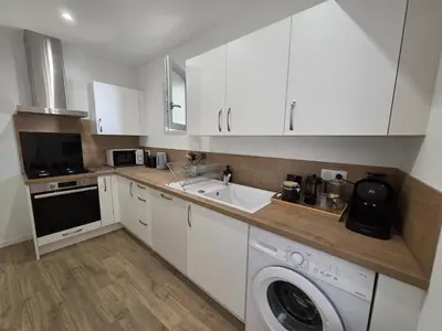 Cuisine ou kitchenette dans l'établissement Au son de l'eau