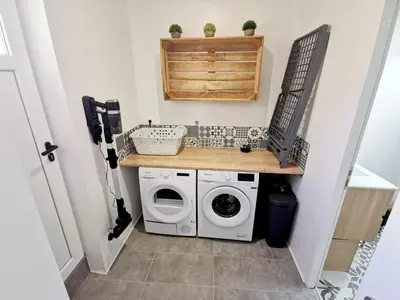 Cuisine ou kitchenette dans l'établissement L Escale Esnandaise