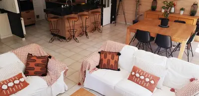 Coin salon dans l'établissement Villa CLOTESS