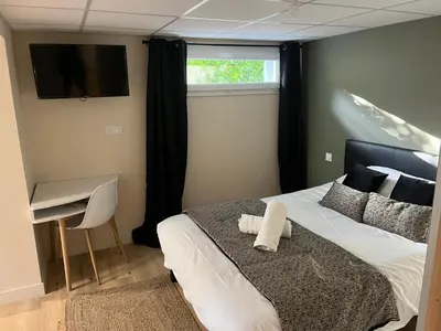 Un ou plusieurs lits dans un hébergement de l'établissement Logis de Bois Vert