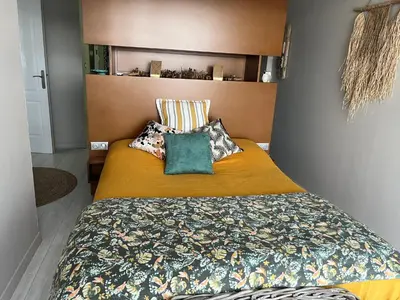 Un ou plusieurs lits dans un hébergement de l'établissement Maison Serenity aytre