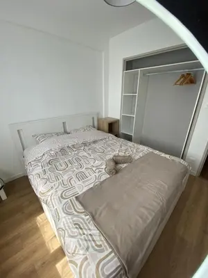 Un ou plusieurs lits dans un hébergement de l'établissement La maison des rêves t4 avec jardin