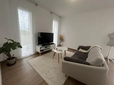 Télévision ou salle de divertissement dans l'établissement Pavillon 
