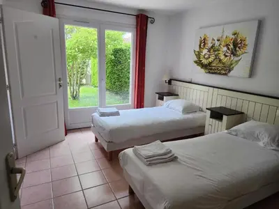 Un ou plusieurs lits dans un hébergement de l'établissement Villa in Les Forges with Golf and Pool