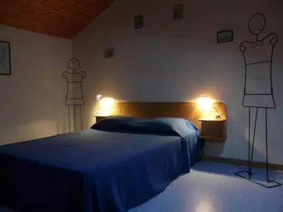 Un ou plusieurs lits dans un hébergement de l'établissement Les boulites