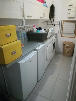 Cuisine ou kitchenette dans l'établissement Maison de vacances
